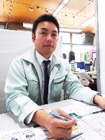 「鹿折、魚町・南町(内湾地区)、南気仙沼の3地区の土地区画整理事業も終盤を迎えている」と語る気仙沼市都市計画課の三浦博之氏(写真:日経BP総研)