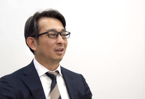 北海道日本ハムファイターズの前沢賢・取締役事業統轄本部長(写真:日経BP 総合研究所)