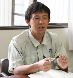 タキイ種苗研究農場生理化学研究グループの富永直樹さん(写真:編集部)