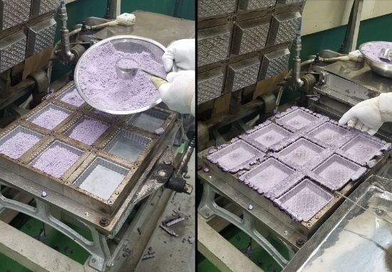 紫いも味のトレイの焼成作業(写真提供:丸繁製菓)