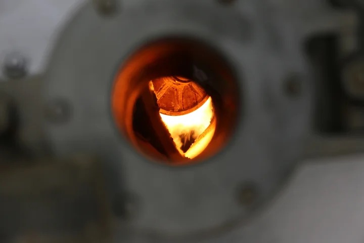 Inside the ignited boiler furnace